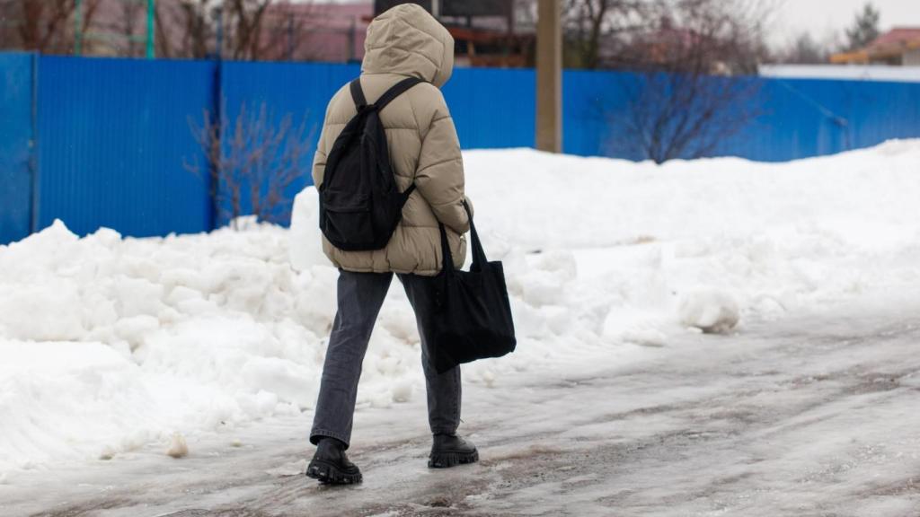 Imagen de archivo de una persona abrigada