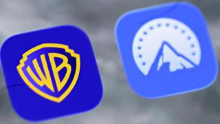 Los logotipos de las aplicaciones de Warner Bros y Paramount en una pantalla de un 'smartphone'.