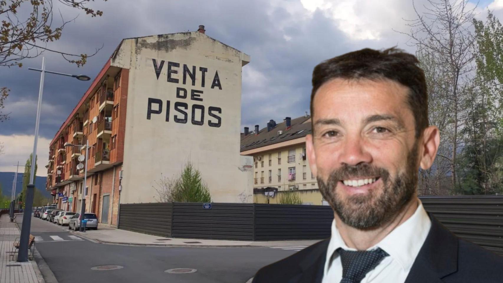 Enrique Pueyo, alcalde de Aínsa, y unos pisos a la venta en la localidad.
