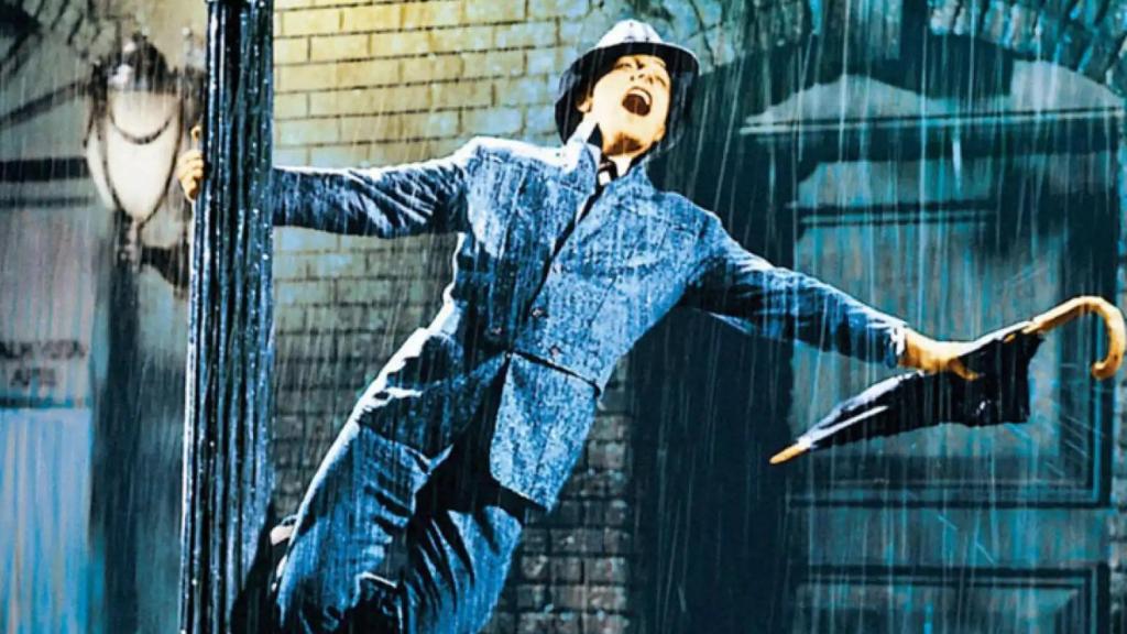 El personaje de Gene Kelly cantando bajo la lluvia en la película del mismo nombre es la representación cinematográfica de la felicidad pura.