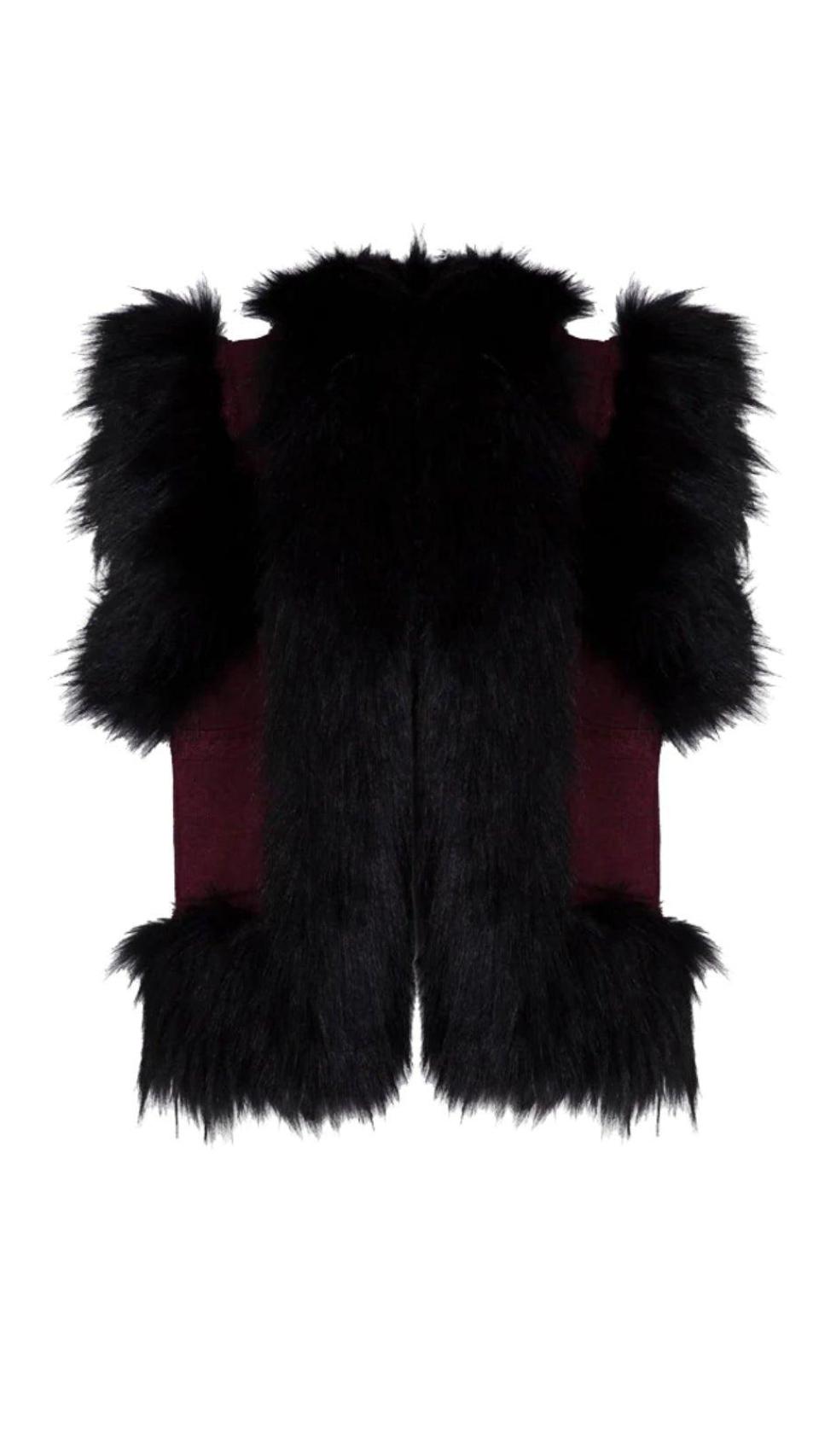 Chaleco negro de The Extreme Collection.