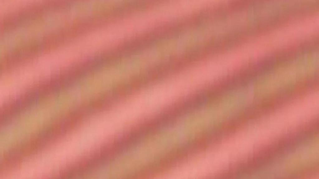 Un cristal de tiempo, visto con el microscopio. Imagen: Zhao & Smalyukh, Nature Materials