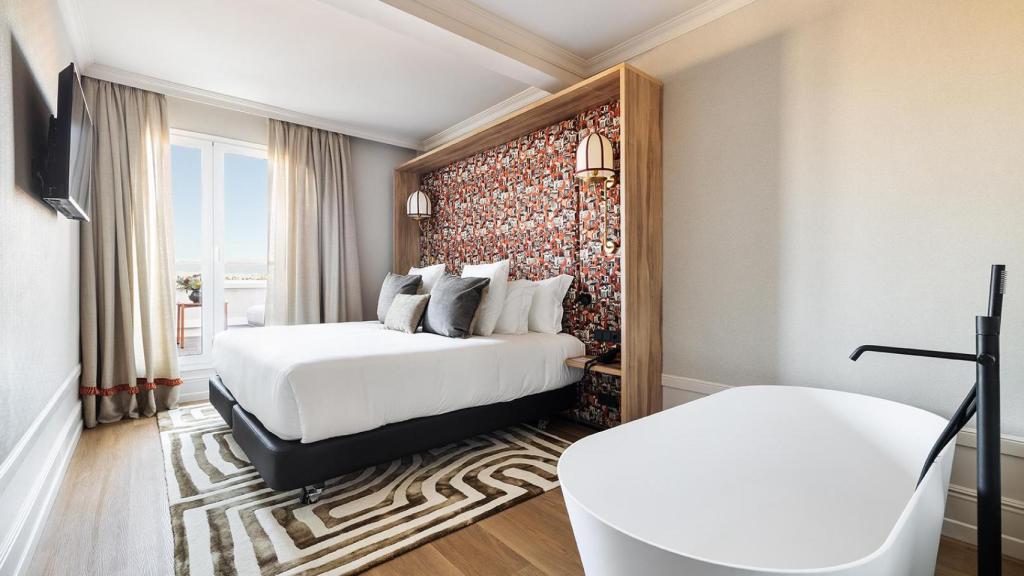 Una de las habitaciones de One Shot La Latina.