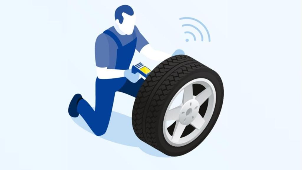 Una ilustración de un técnico revisando un neumático