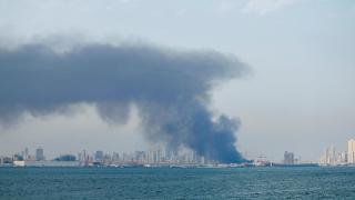 Smoke rises after alleged Iranian missile attacks, after bombings by the United States and Israel against Iran, in Manama.