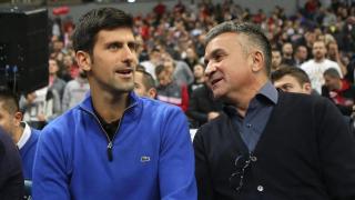 Novak Djokovic, con su padre.