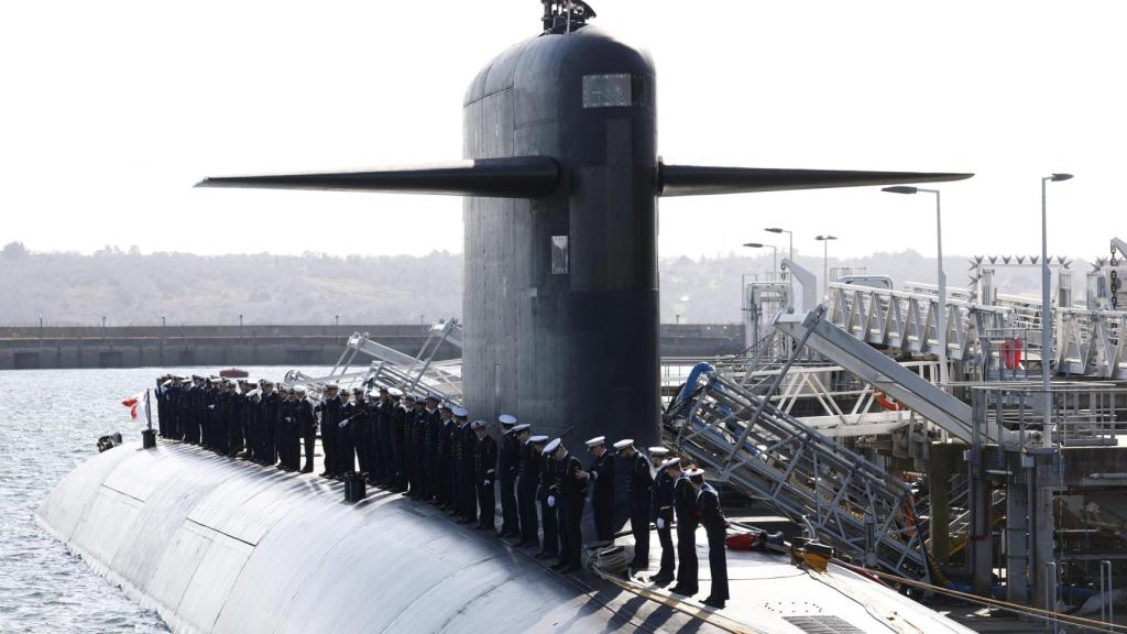 Members of the French Navy await the arrival of French President Emmanuel Macron aboard a submarine at the Ile Longue nuclear submarine naval base in Crozon, France, March 2, 2026.