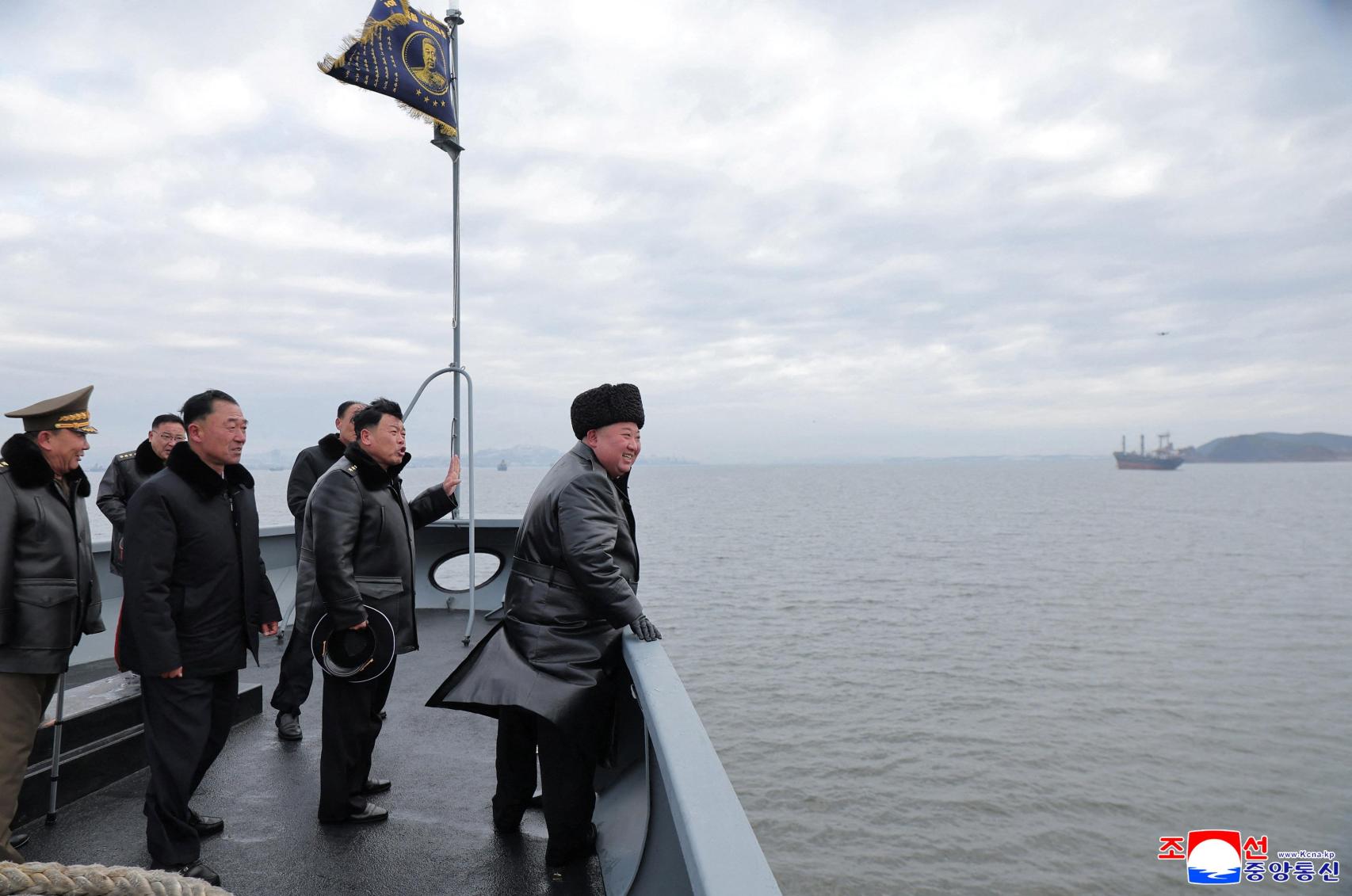 Kim Jong-un on the deck of the destroyer 'Choe Hyon'.
