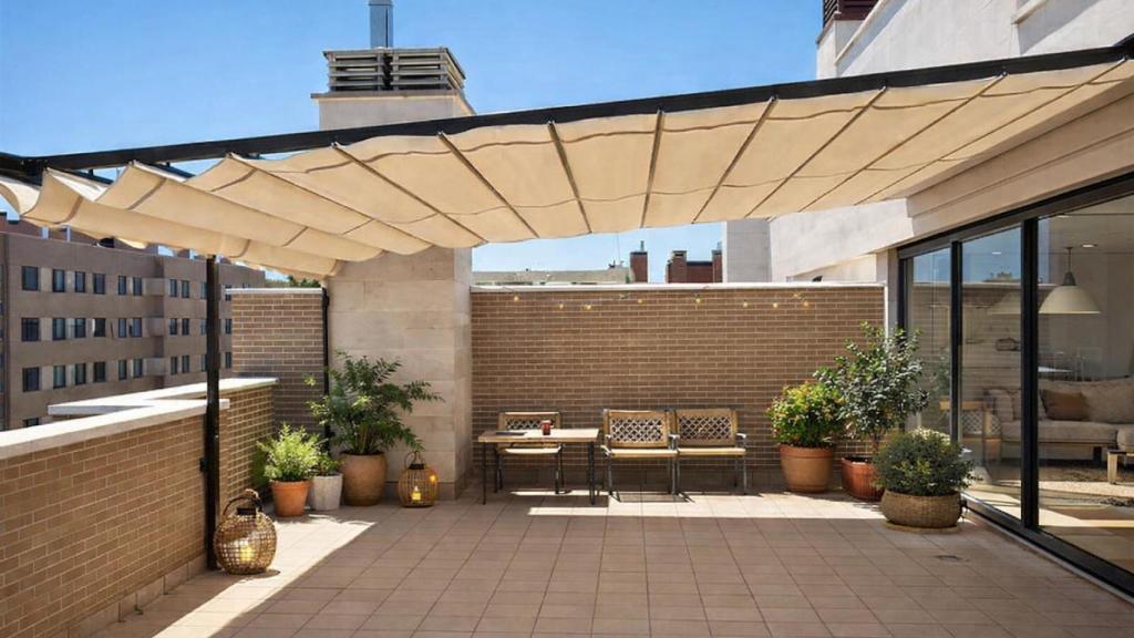 Terraza con pérgola.