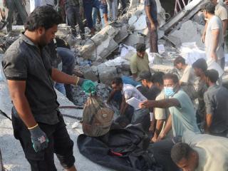 A school backpack unearthed during debris removal operations at a bombed school in Iran.