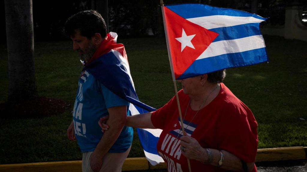 Cuban citizens, residents in the United States, gather to call for the fall of the Cuban regime.