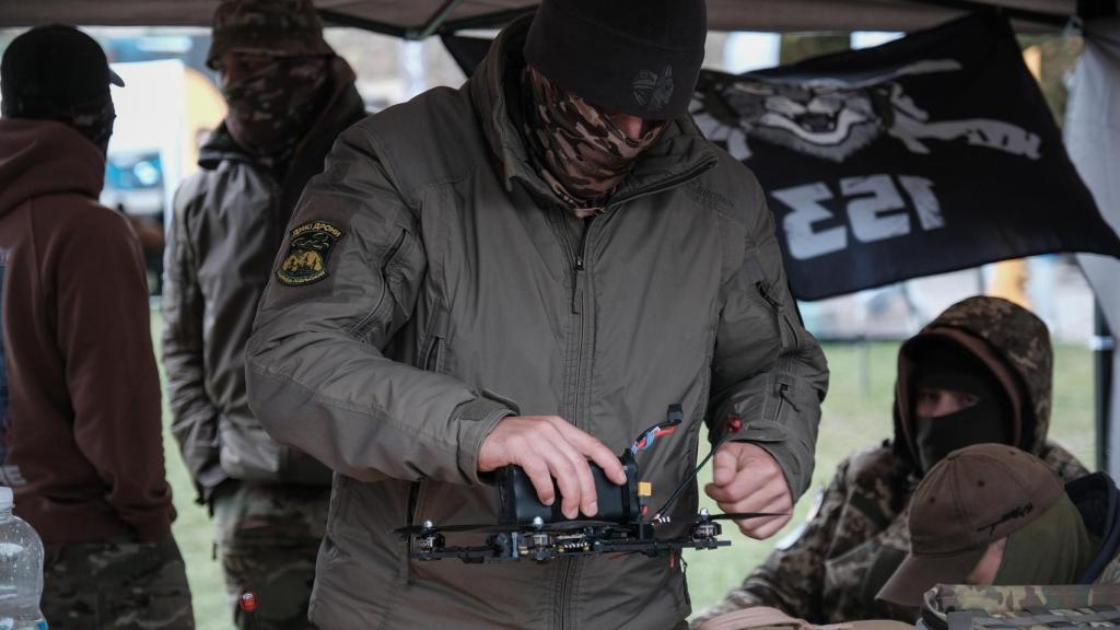 Ukrainian pilots prepare to participate in a drone test during an unmanned vehicle tournament held last fall in western Ukraine