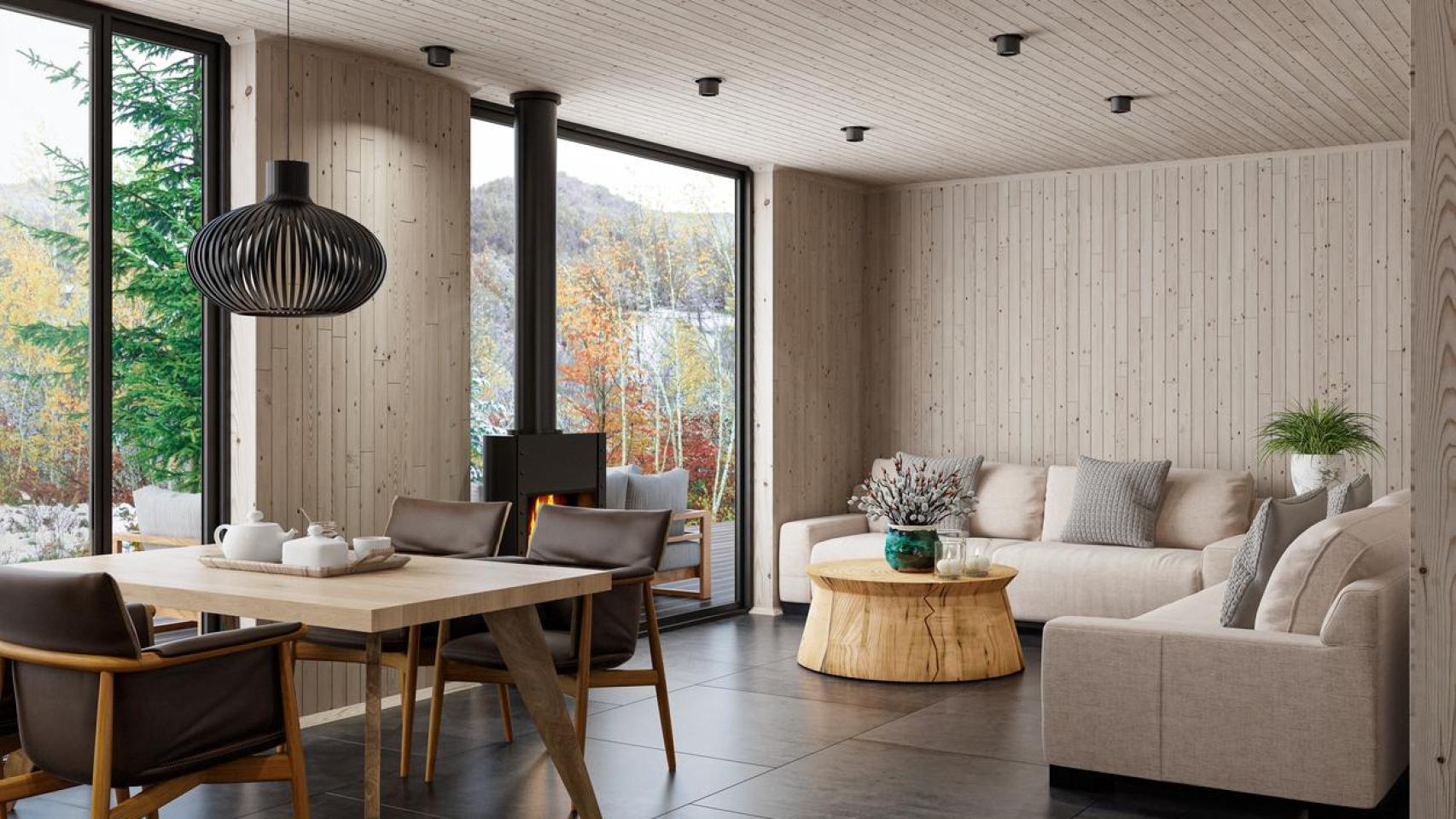 Sala de estar con sofás, chimenea y detalles en madera natural.