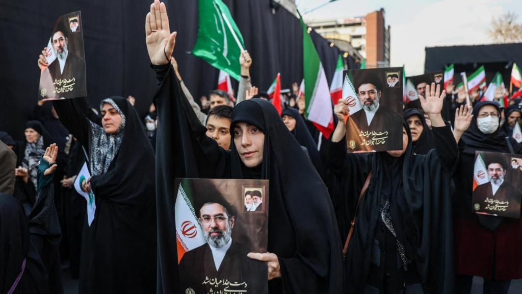 People gather in Tehran in support of Iran's new supreme leader Mojtaba Khamenei.