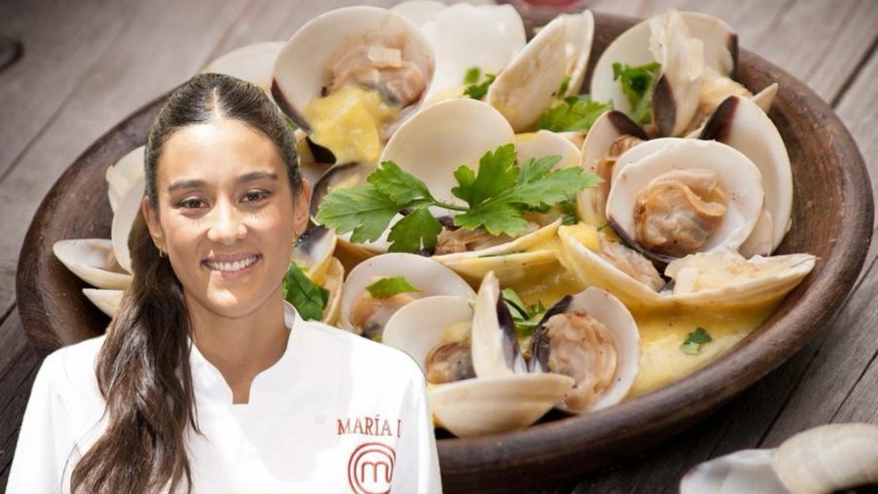 María Lo junto a un plato de almejas.