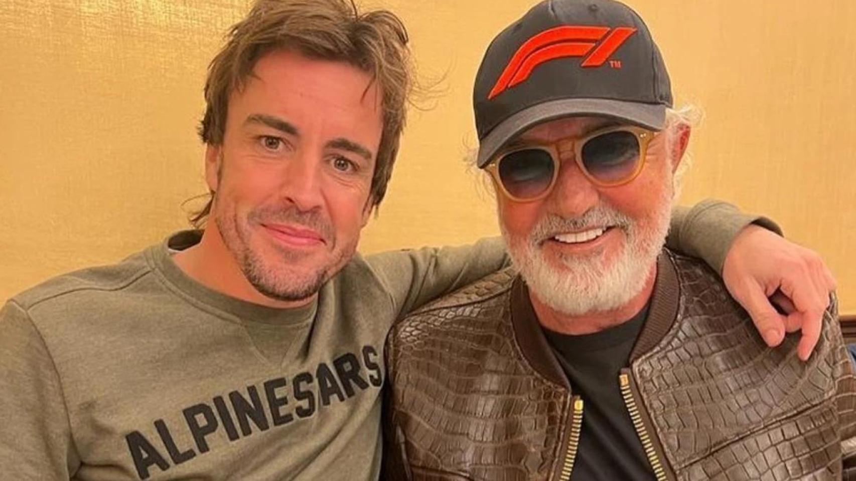 Fernando Alonso, junto a Flavio Briatore.
