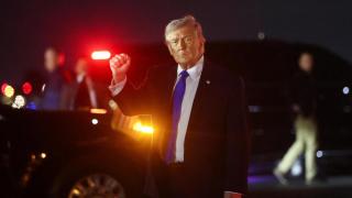 US President Donald Trump after disembarking from Air Force One at Palm Beach International Airport, March 13, 2026.