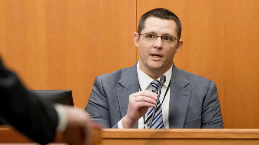 Prosecution attorney Clint Benson testifies during the trial.