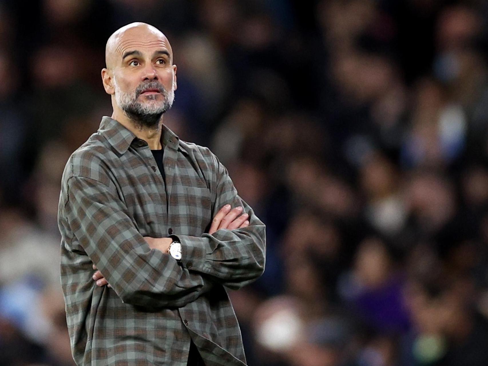 Pep Guardiola, vestido con una camisa de cuadros de la marca Giglio, durante el partido contra el Real Madrid