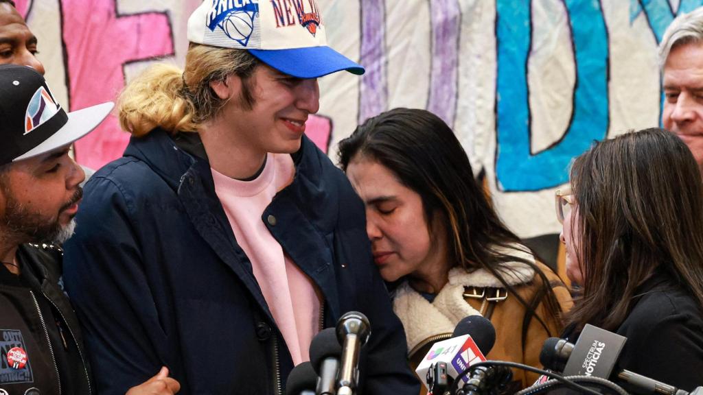 Raiza, Dylan's mother, hugs her son outside the ICE center in Pennsylvania.