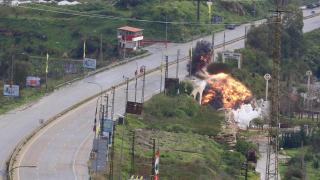 Smoke and flames rise after an Israeli attack on the Qasmiya Bridge near Tyre, southern Lebanon.
