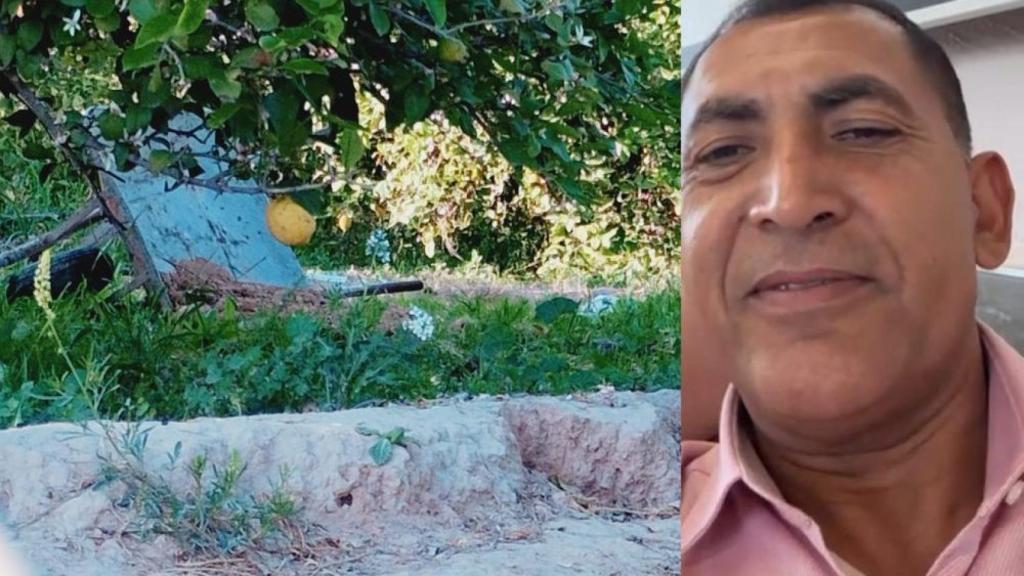 Una carretilla volcada, con restos de arena, justo al lado de la zona del huerto de limoneros donde enterraron el cadáver de Prudencio Antonio en su casa de campo en Librilla.
