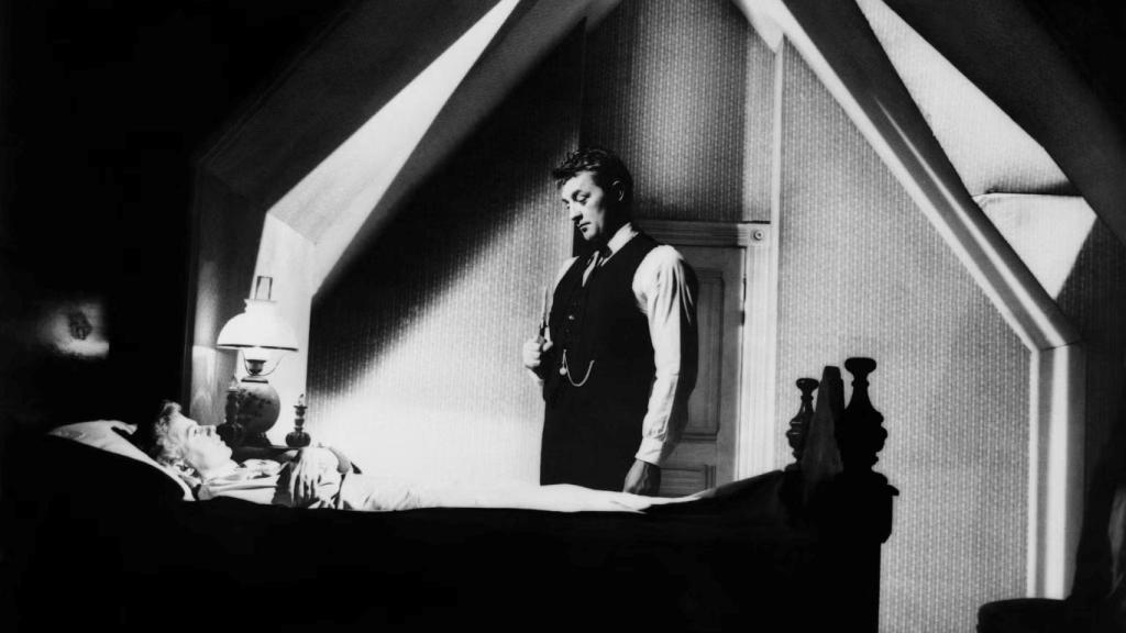 Robert Mitchum y Shelley Winters en 'La noche del cazador' (1955)