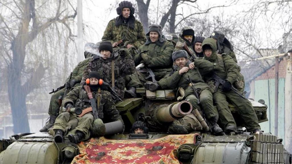 Russian soldiers in a tank on Ukrainian soil.