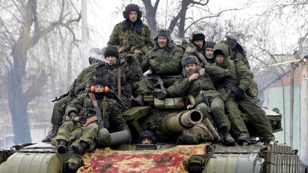 Russian soldiers in a tank on Ukrainian soil.