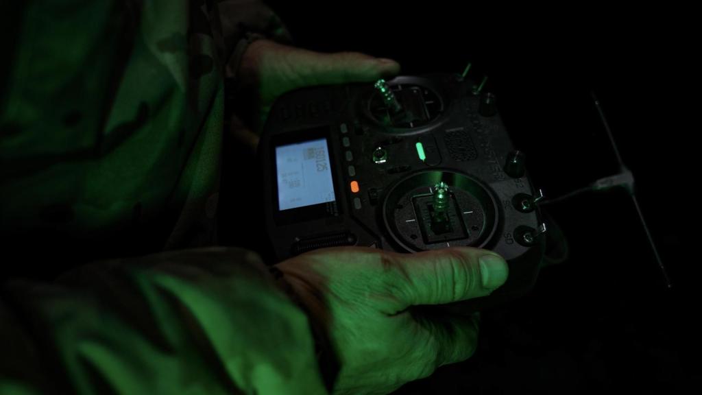 A Ukrainian pilot operates an attack drone on the Pokrovsk combat front