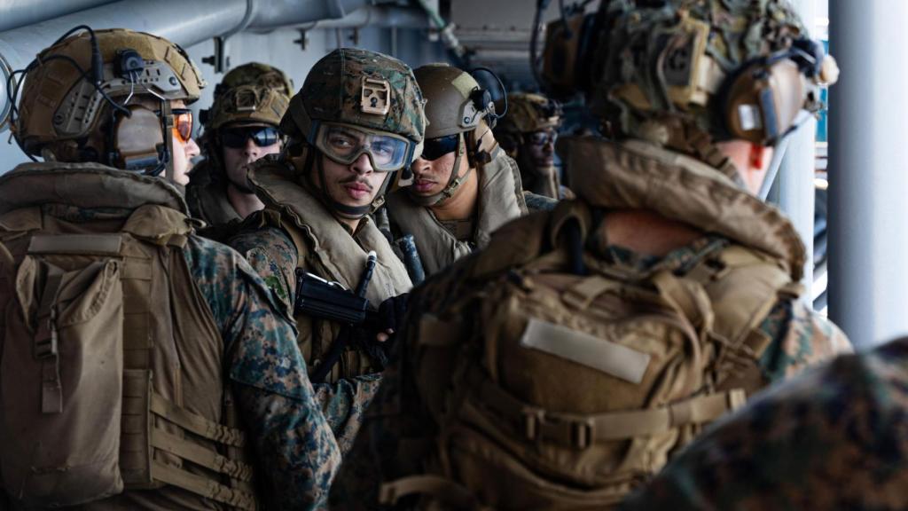 US sailors and marines aboard the USS Tripoli.