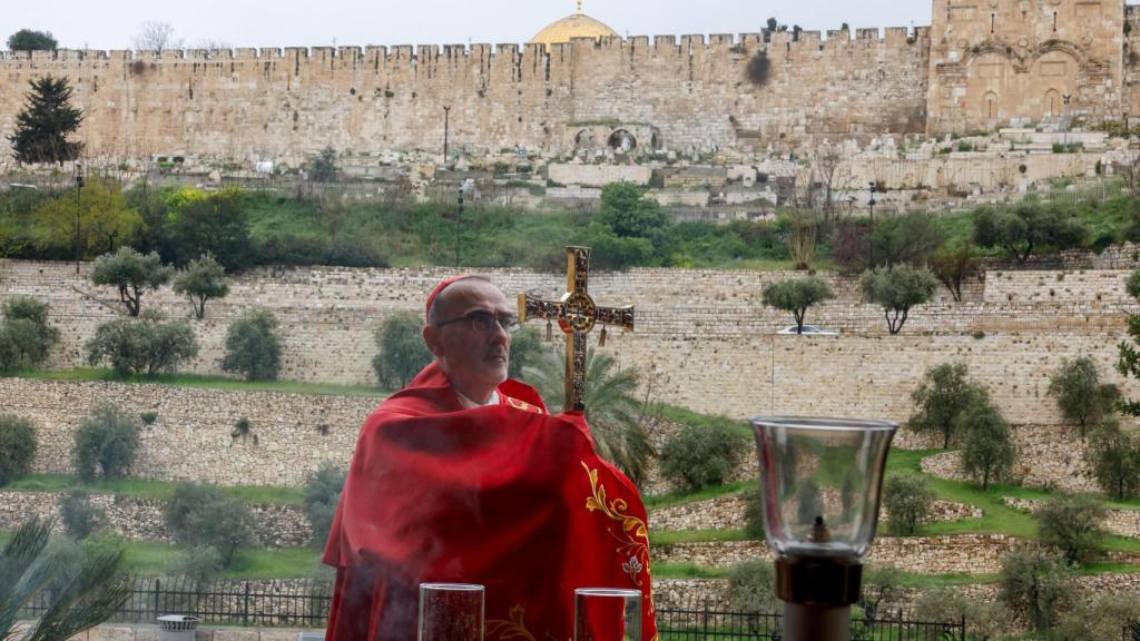 Cardinal Pierbattista Pizzaballa, Latin Patriarch of Jerusalem, officiates a prayer mass on the occasion of Palm Sunday.