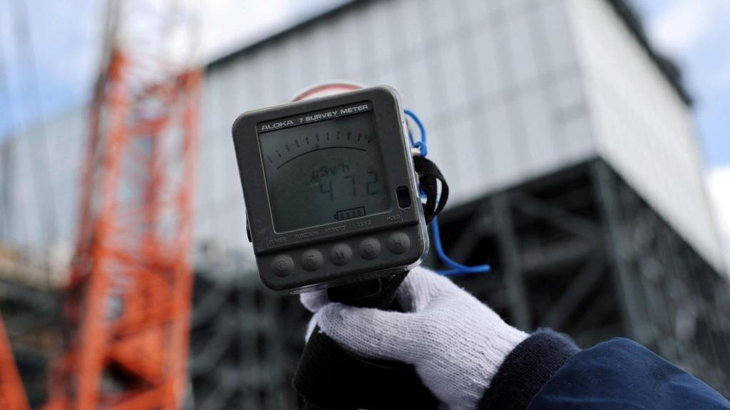 Using a Geiger counter at the Fukushima Daiichi plant.