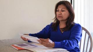 Lorena Alvarado Hill lost her health insurance due to a debt of one cent a month.