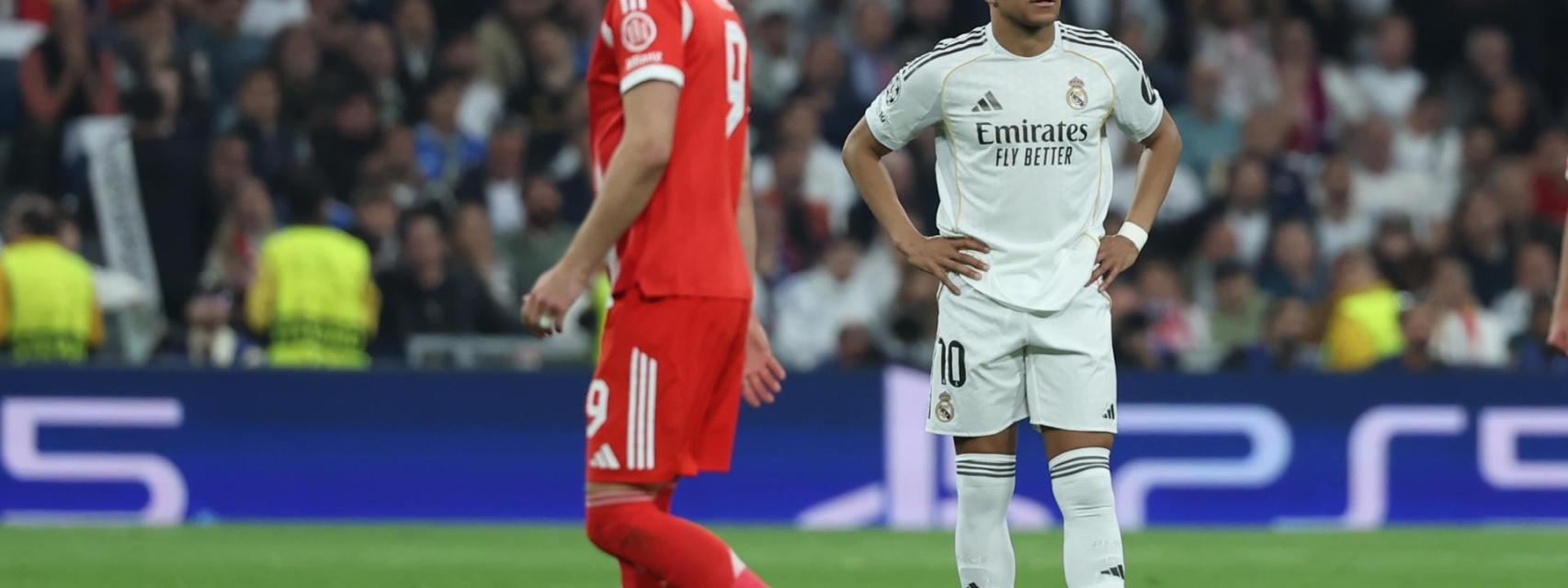 Harry Kane y Mbappé, de fondo, durante el Real Madrid - Bayern