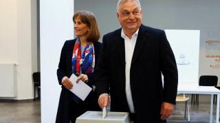 Hungarian Prime Minister Viktor Orban and his wife Aniko Levai vote during the Hungarian parliamentary elections in Budapest, Hungary, on April 12, 2026