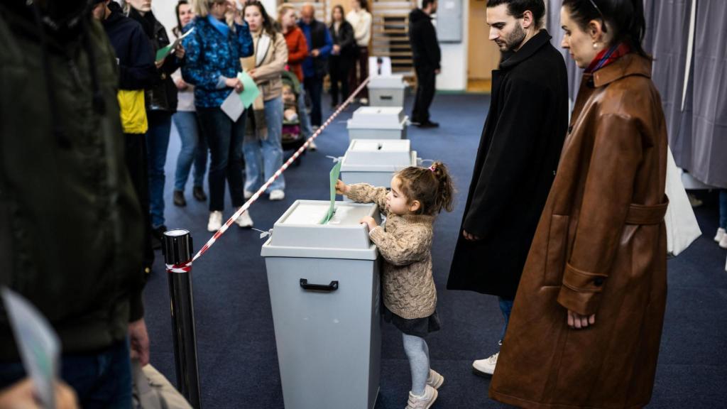 People vote during the Hungarian parliamentary elections in Budapest, Hungary, on April 12, 2026.