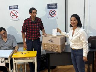 Peruvian presidential candidate Keiko Fujimori casts her vote at a polling station during the general elections in Lima, Peru.