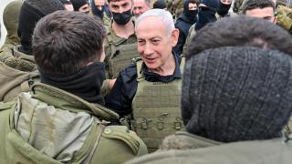 Israeli Prime Minister Benjamin Netanyahu last Sunday with Israeli troops after crossing the border with Lebanon.