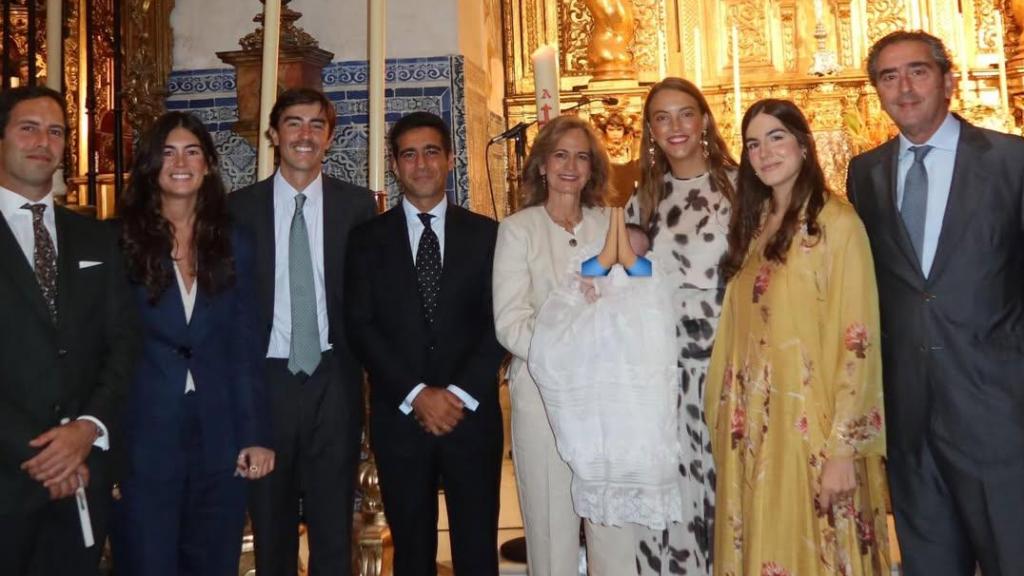 Alberto Herrera y Blanca Llandres, en el bautizo de su hijo.