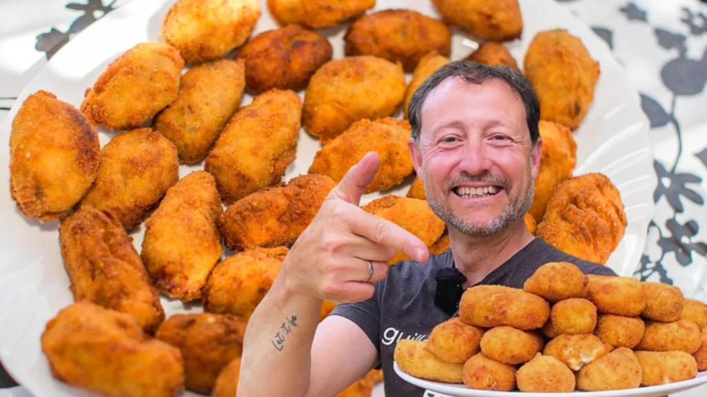 Guillermo Rodríguez y un plato de croquetas.