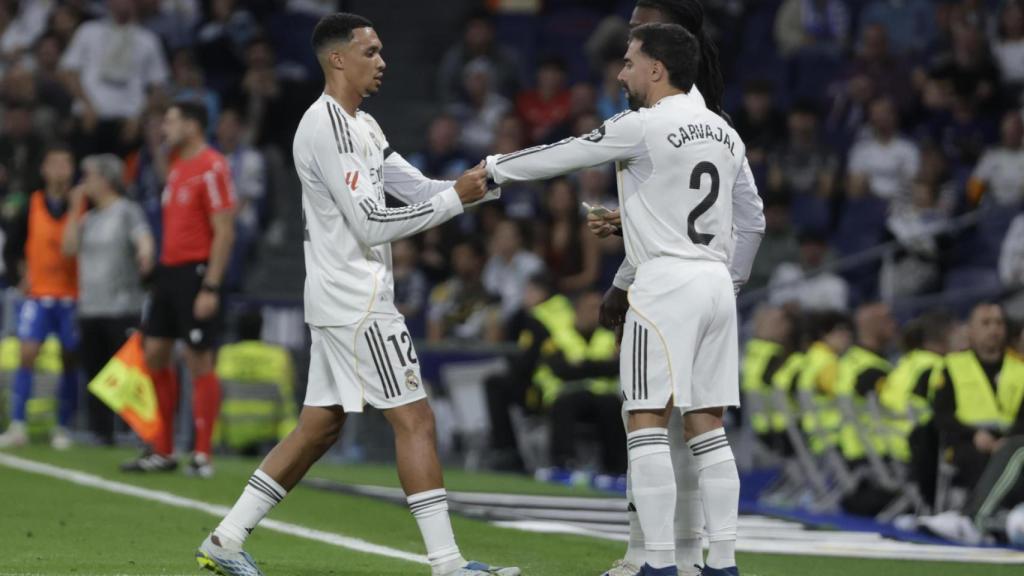 Dani Carvajal receives the captain's armband from Trent Alexander-Arnold before taking to the field