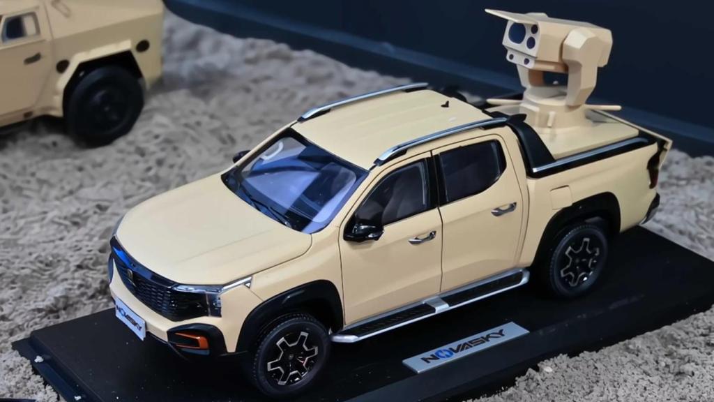 Maqueta del nuevo láser antidrones montado en un camión de China.