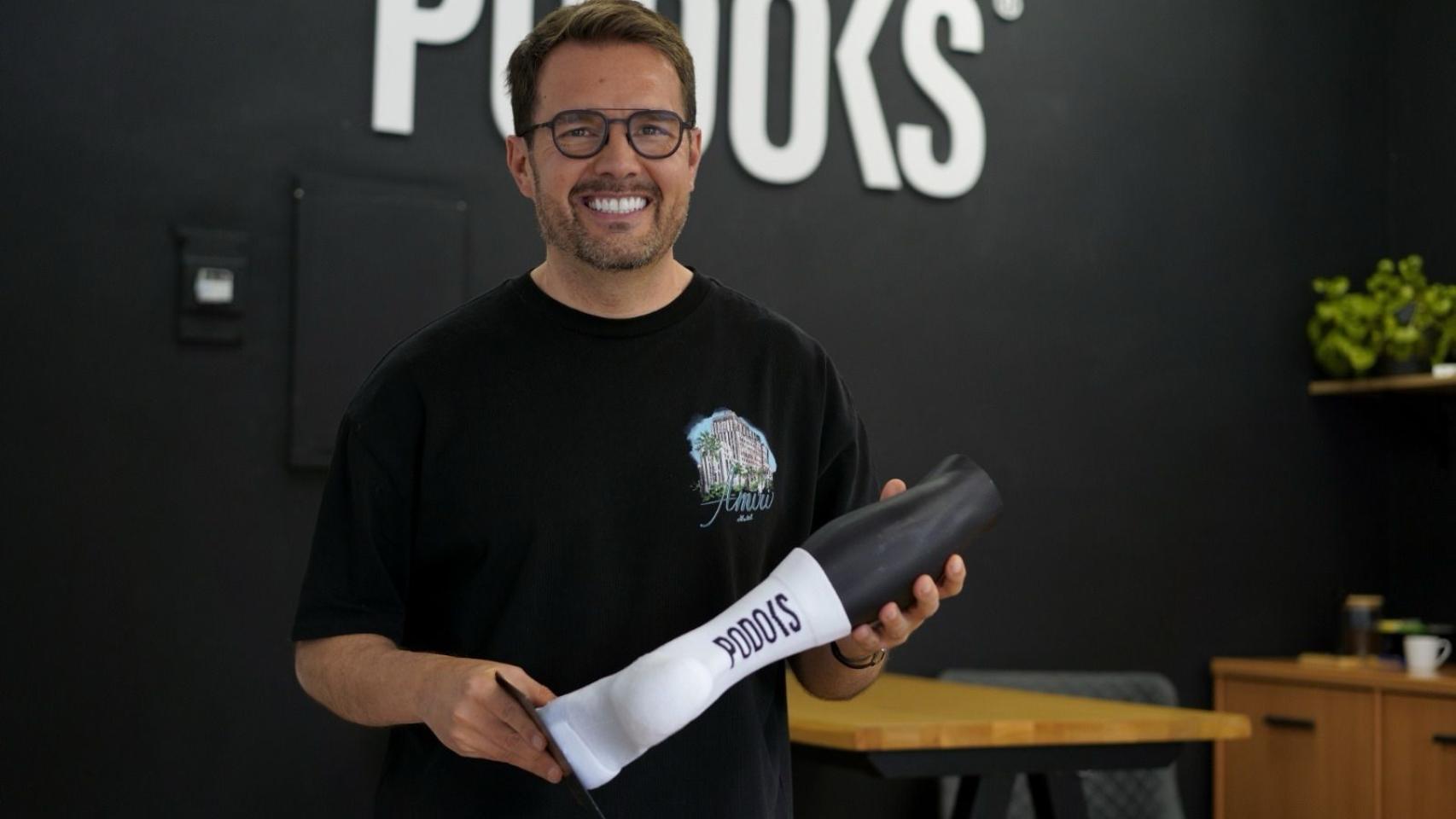 David Moreno con unos calcetines de Podoks.