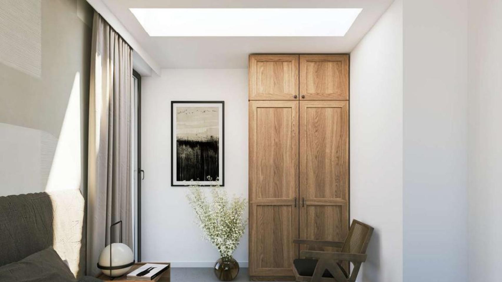 Habitación iluminada por un sistema de cubierta plana de Velux.