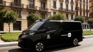 Ilustración de un vehículo autónomo GXR de WeRide y Uber en Madrid.