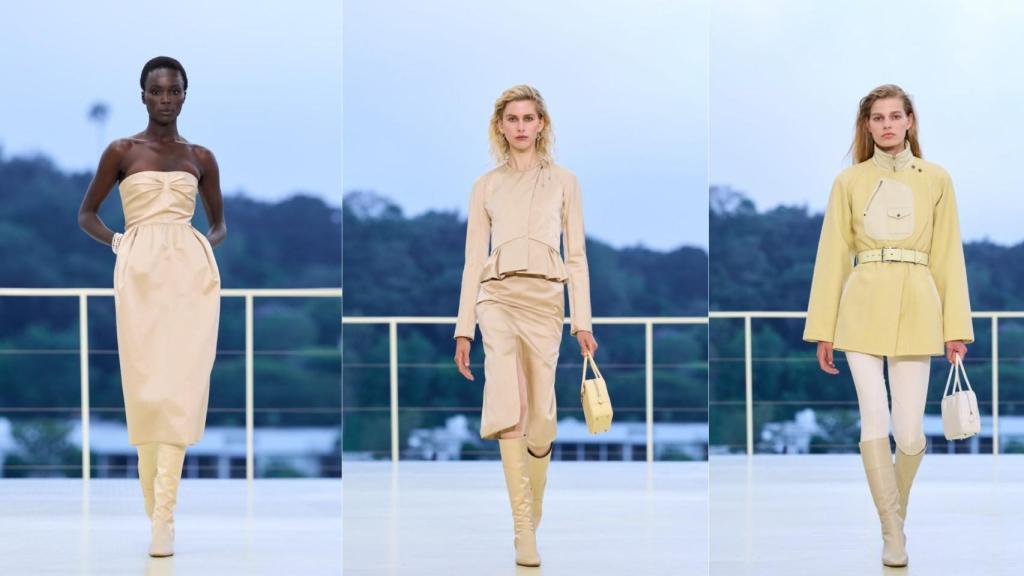 Conjuntos sartoriales de falda y chaqueta, vestidos palabra de honor con silueta globo y abrigos estructurados definen la sutil elegancia de la gama en amarillo mantequilla.