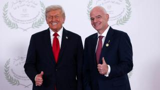 Donald Trump con Infantino en un evento.