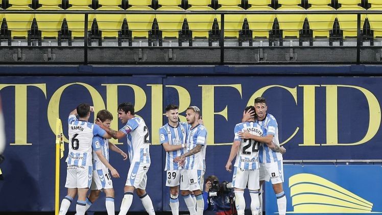 Los jugadores del Málaga celebran un gol en Villarreal.