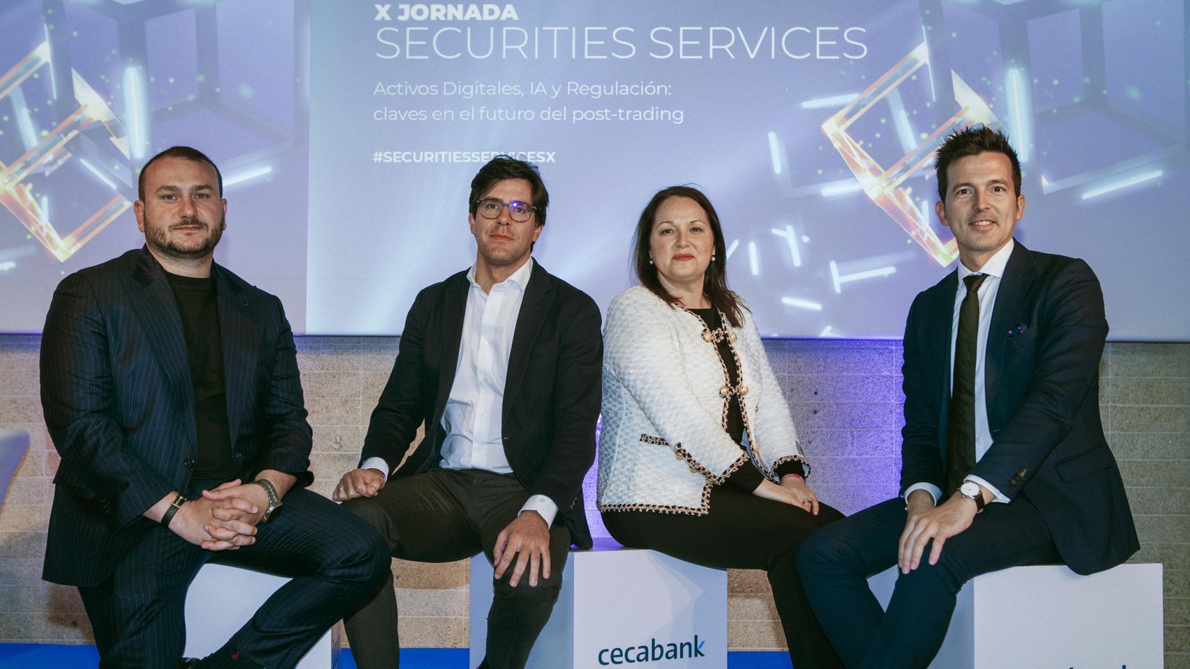 En la imagen (de izquierda a derecha), Andrei Manuel, cofundador y COO de Bit2Me; Anibal Martín, Corporate Development Director de Cecabank; Aurora Cuadros, directora corporativa de Securities Services en Cecabank; y Abel Peña, Chief Sales Officer de Bit2Me.